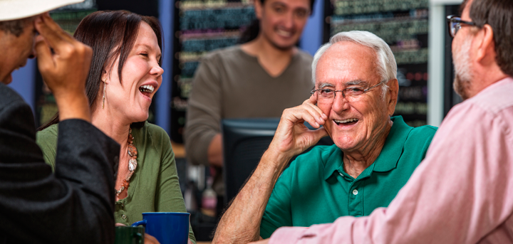 A group of people socialising at a lunch club