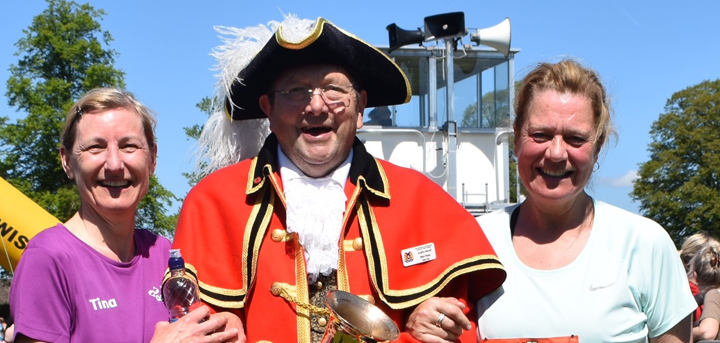 Runners Tina and Kate with Market Drayton's town crier.