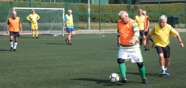 Older men playing walking football