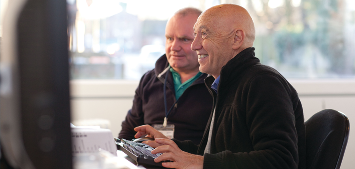 A man learning new computer skills