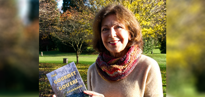 Lady Vice Captain, Carrie Lees holding The Gourmet Golfers Cookbook