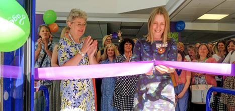 Claire Clackett DL cutting the ribbon to open our new office