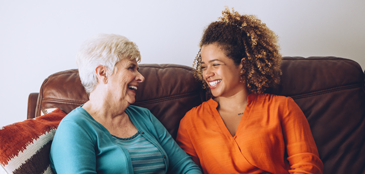 An older woman and her befriender laughing