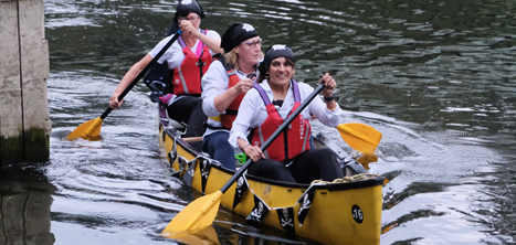 Age UK Shropshire Telford & Wrekin fundraisers in a canoe