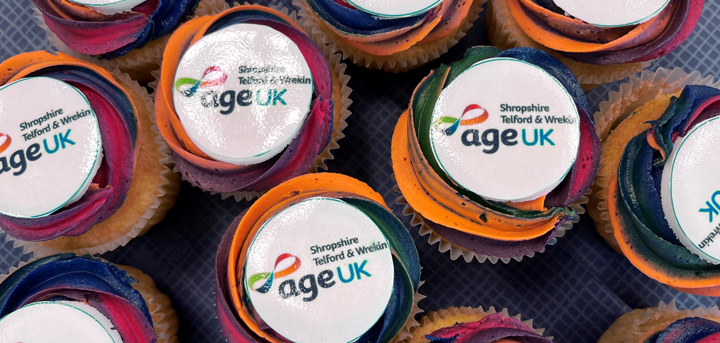 Cup cakes decorated with the Age UK Shropshire Telford & Wrekin logo