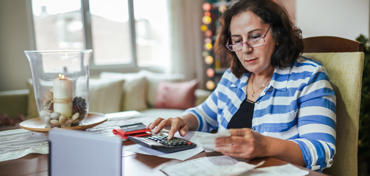 Woman using a calculator