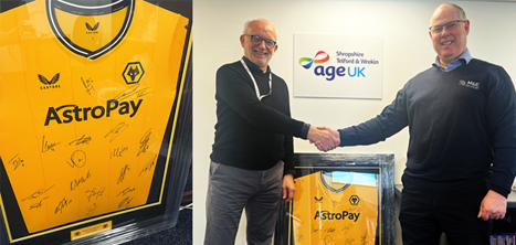 Signed Wolves football shirt and Kevin Moore shaking hands with Stephen Piper