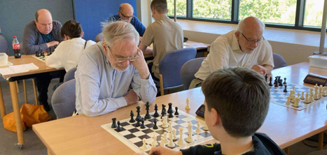 Players meet at the intergenerational chess tournament at Ludlow Library