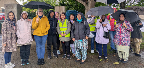 Members of Khushdil day centre braving the rain