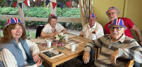 Dementia support group members celebrating VE Day