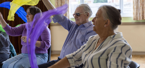Older people exercising gently