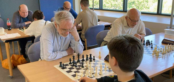 Players meet at the intergenerational chess tournament at Ludlow Library