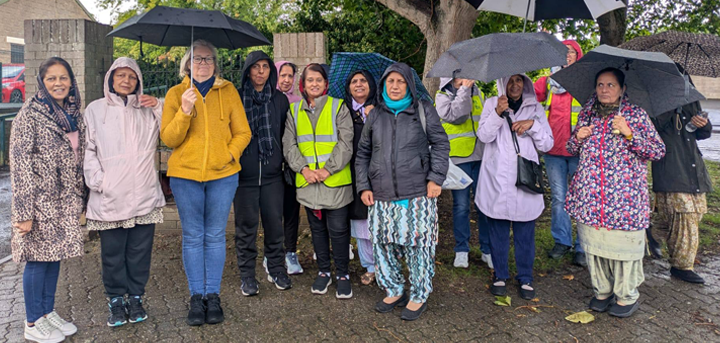 Members of Khushdil day centre braving the rain