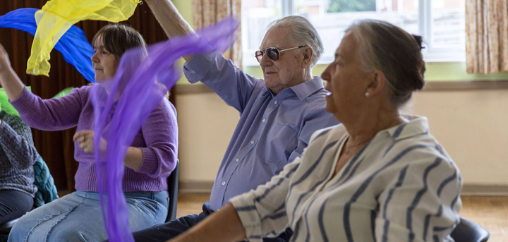 Older people exercising gently