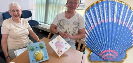 Craft group members with their creations and a close up of one a decoarted shell