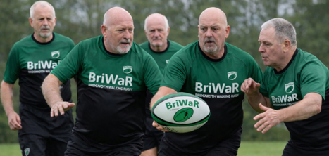 Older men playing walking rugby