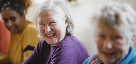 Three women laughing