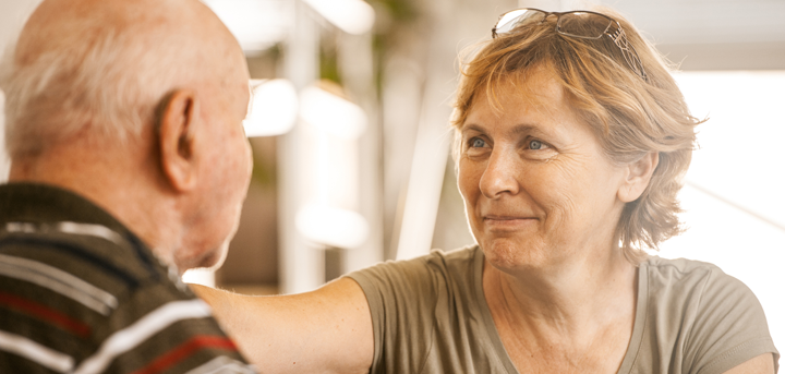 Older man and woman talking