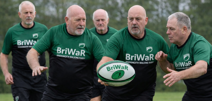 Older men playing walking rugby