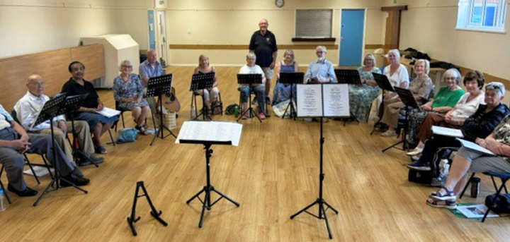 The Acorn Singers with their newly donated music stands