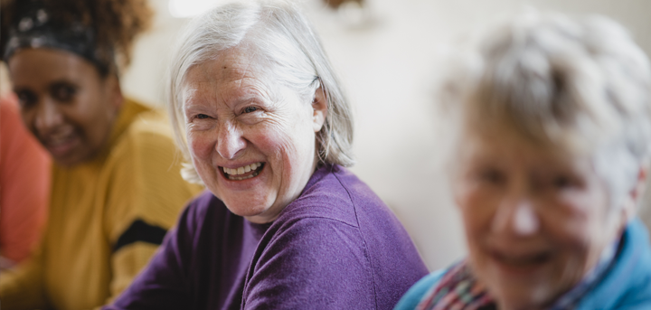 Three women laughing