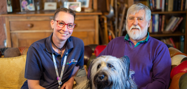 Home Support Worker Clare, with David and Barra the dog