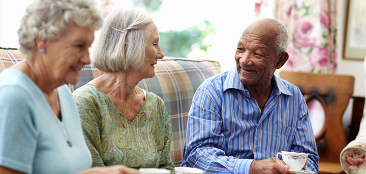 Older people enjoying tea