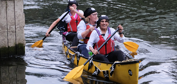 Age UK Shropshire Telford & Wrekin fundraisers in a canoe