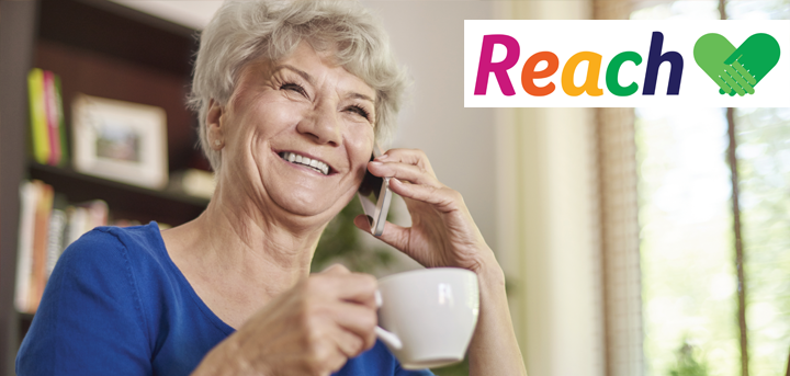 An older woman enjoying a phone call from a Reach befriender