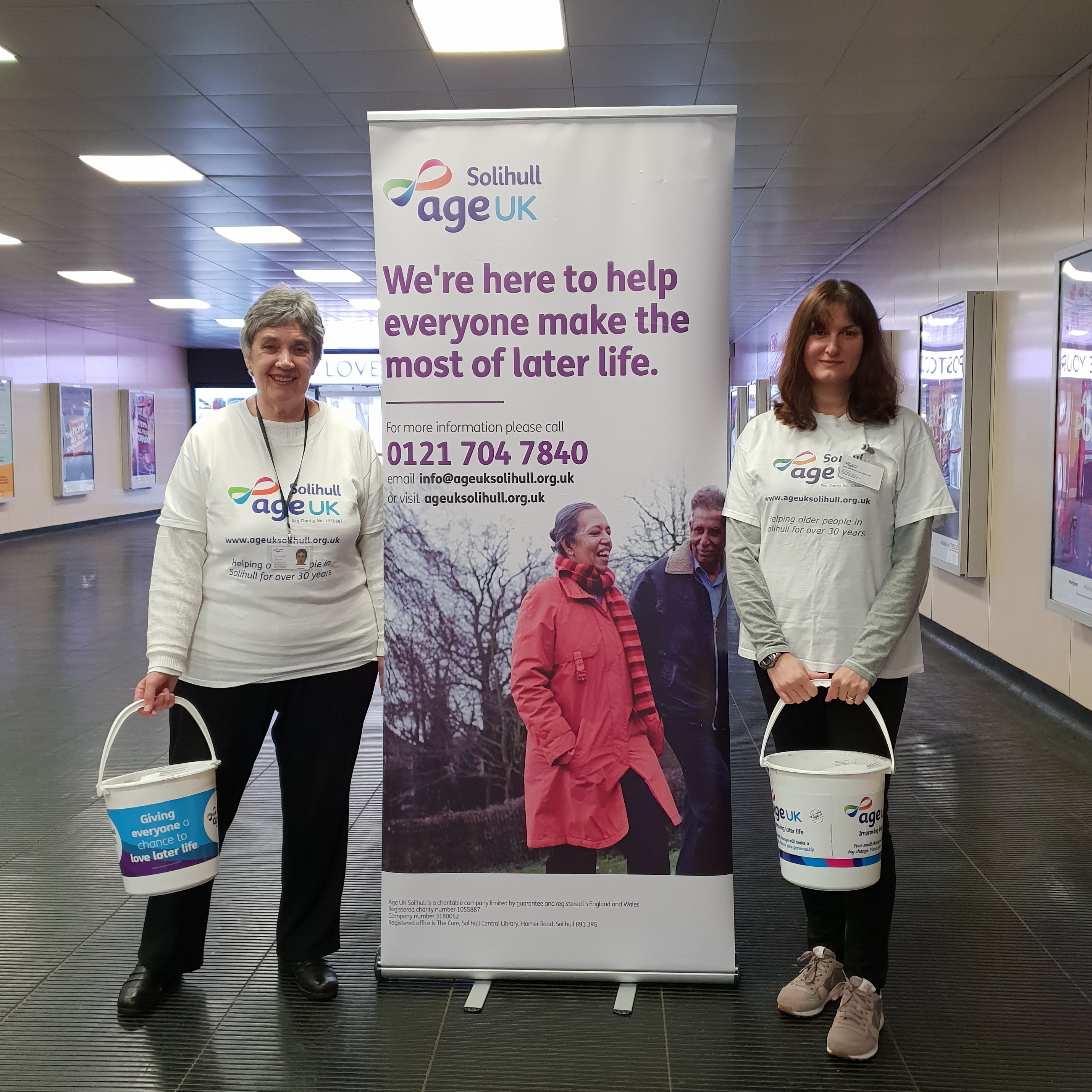 Carol and Giulia helping at a collection day at Birmingham International Railway Station