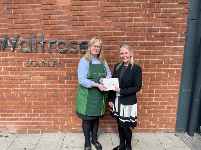 Collette from Waitrose presenting cheque for Activities Room.jpg
