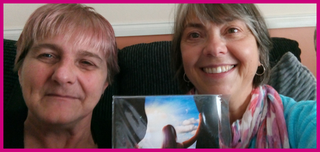 Michelle and Kay smiling and holding Michelle's first recorded song