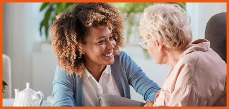 Younger woman smiling at older lady