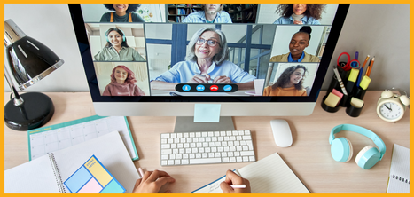 Person using computer with people on the screen