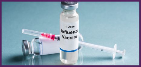 Flu vaccine in a bottle and a needle