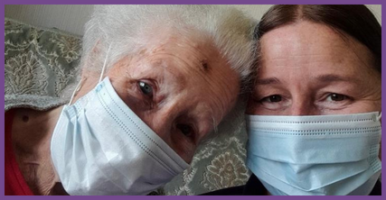 Age UK Wakefield District Home Support Worker wearing face mask with client