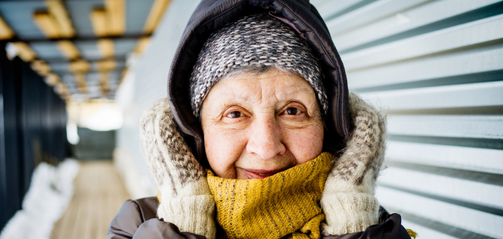 Lady with her hood pulled up in the cold