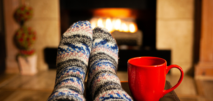 Warm socks in front of a fire