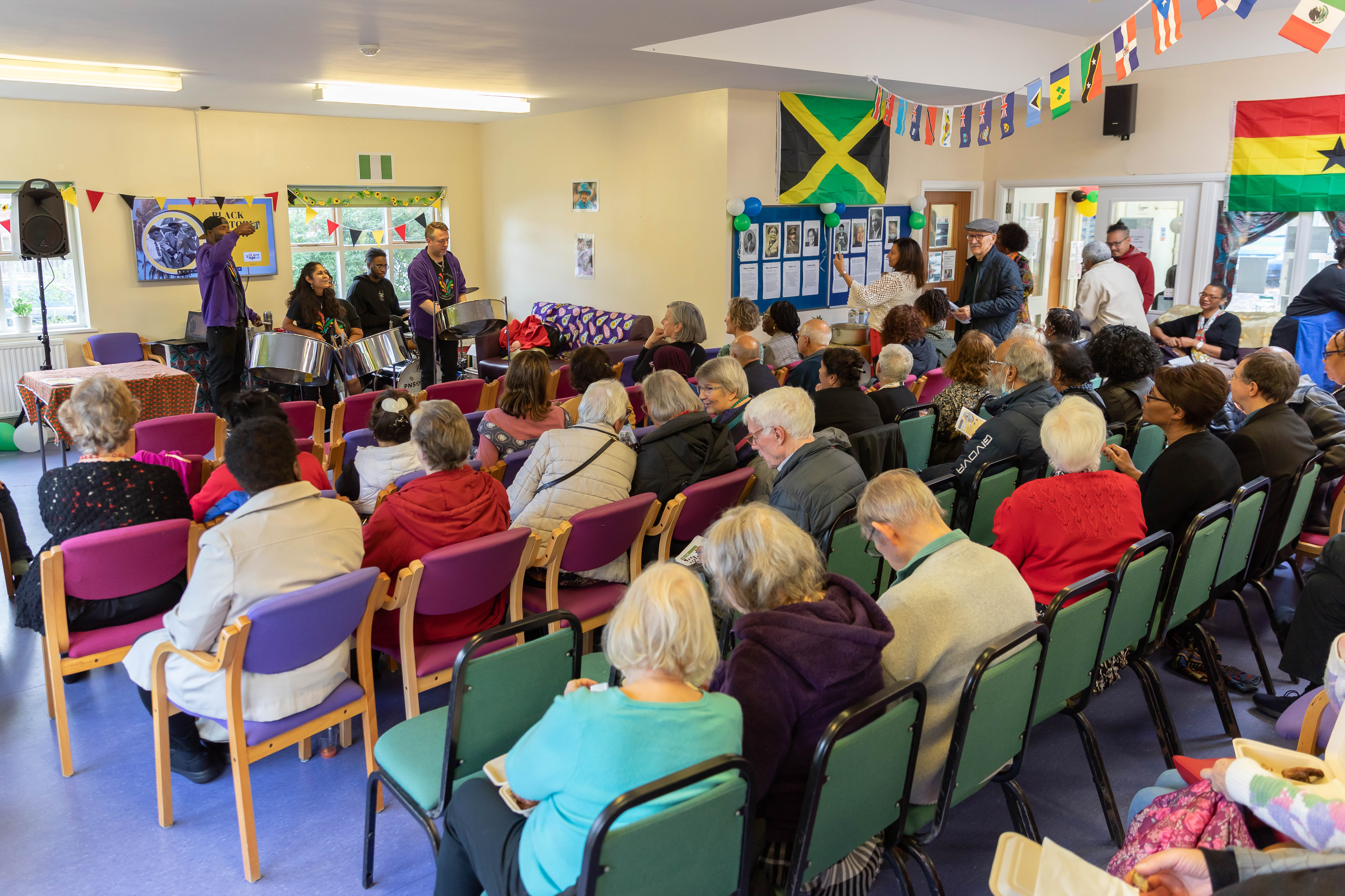 Age UK Barnet enjoying the steel pan orchestra 