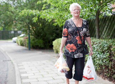 Woman carrying shopping bags