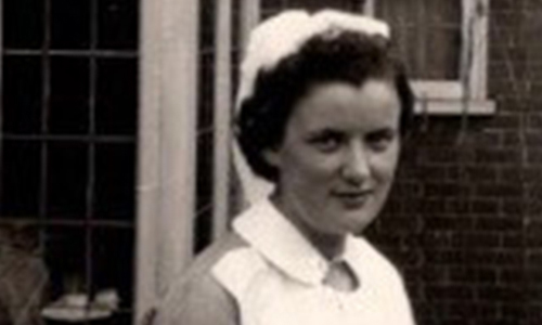 A black and white picture of a nurse