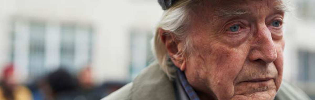 An older man looking sad