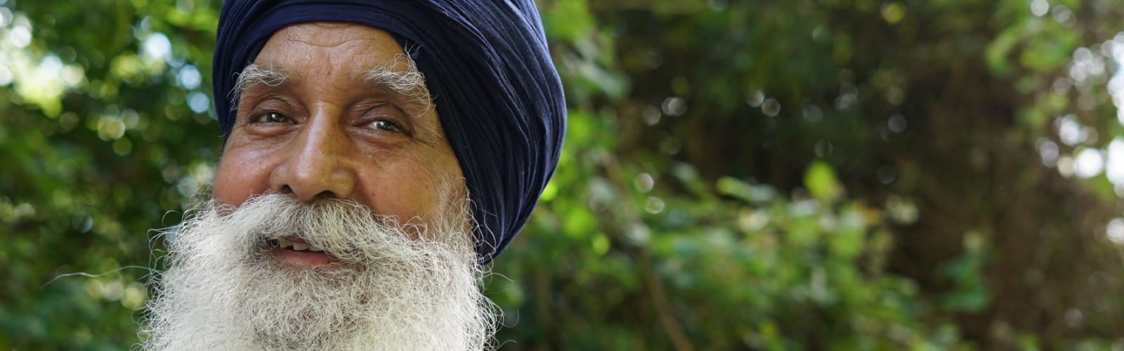 Rajinder, a 73-year-old man of Indian descent known as 'the skipping sikh', smiles at the camera