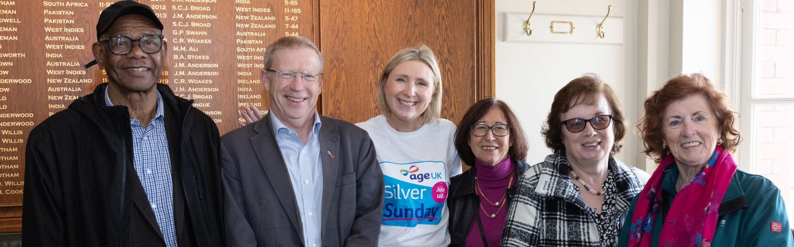 Paul Farmer, Chief Executive of Age UK, with a group of older people