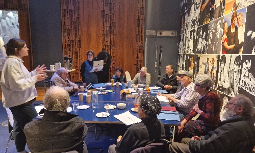 A group of older people at a creative writing workshop